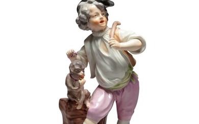 A Vienna porcelain figure of a young boy with a monkey, Circa 1760