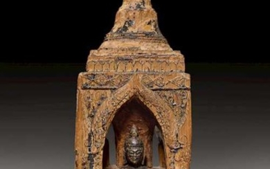 A WOOD PAGODA WITH FOUR BUDDHAS.