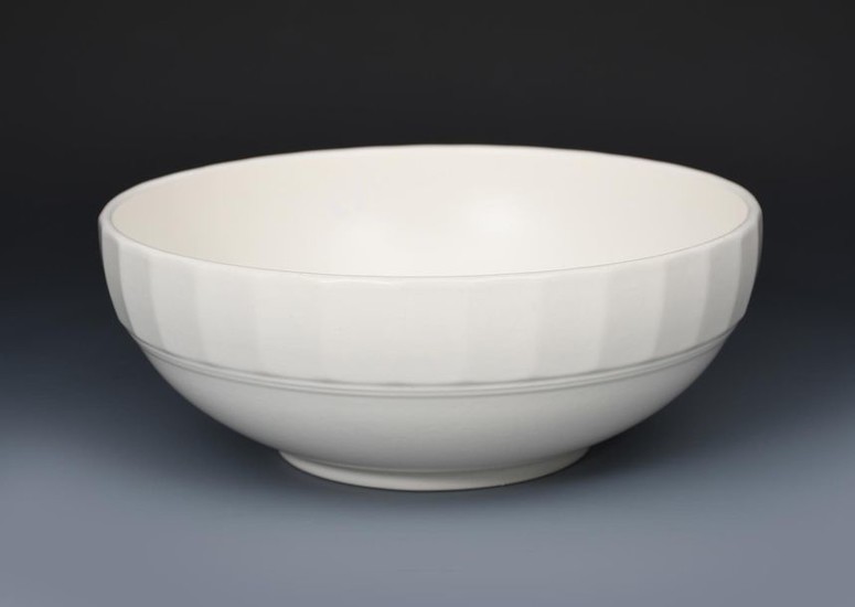 A Wedgwood Moonstone bowl designed by Keith Murray,...