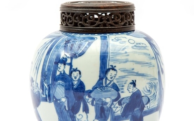 A blue and white vase with figures