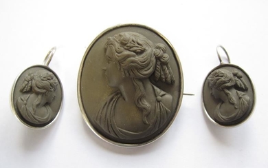 A carved lava Cameo Brooch of bust in profile...