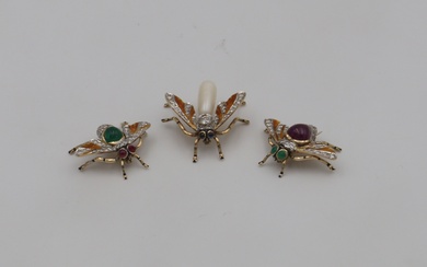 A collection of 3 brooches