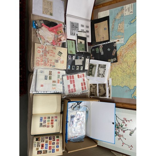A collection of first day covers and various stamps from aro...
