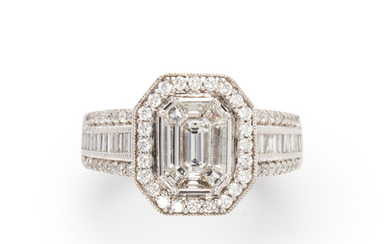 A diamond and fourteen karat white gold ring