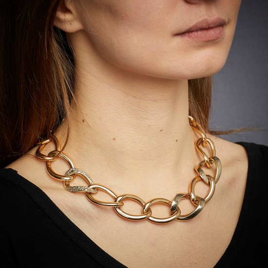 A diamond and gold necklace by POMELLATO.