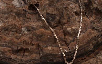 A diamond solitaire pendant, the round brilliant cut stone c...