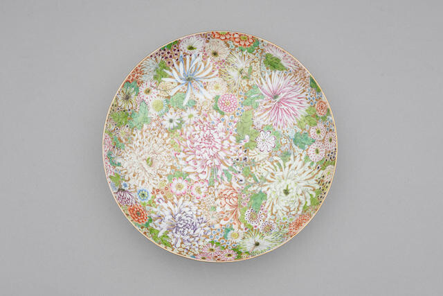 A famille-rose enamelled and gilt 'hundred flowers' plate