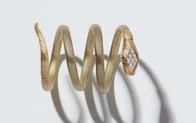 A flexible 14k gold tubogaz snake bracelet with jewelled head.