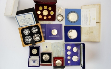 A group of boxed silver and other commemorative coins including Republic of Panama 20 Balboas, 1976 Olympic proof coin set, 1977 British Vir