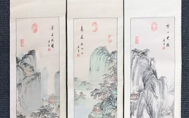 A group of three Chinese mid 20th Century hand painted silk mounted scrolls of mountain landscapes, W. 35cm, L. 133cm.