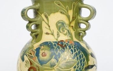 A large C H Brannam Pottery vase by James Dewdney, dated 1894, ovoid with cylindrical neck, the neck applied with three looped handles to the neck, the body painted in slip with large scaly fish swimming amongst waterweed, in green, blue and brown on...