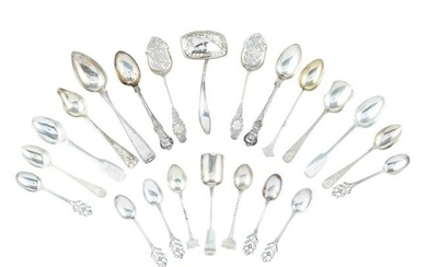 A large mixed collection of teaspoons