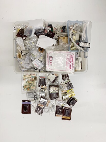 A large quantity of dolls house electrical items, including wires, switches, etc.