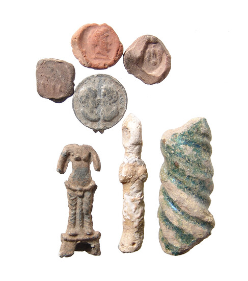 A mixed group of ancient objects in various materials
