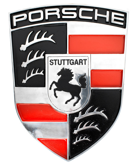 A painted cast aluminium sign depicting the Porsche shield