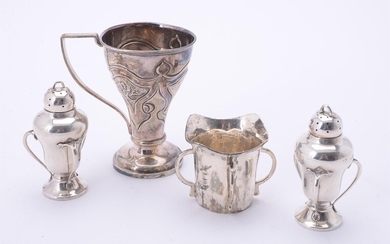 A pair of Art Nouveau silver pepperettes by John Round & Son Ltd.