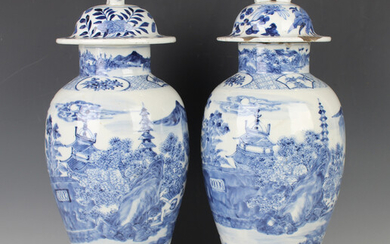 A pair of Chinese blue and white porcelain vases, mark of Kangxi but late 19th century, each baluste