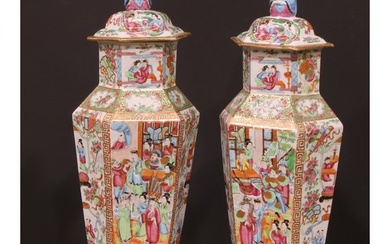 A pair of Chinese famille rose hexagonal vases and covers, p...