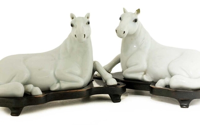 A pair of Chinese white-glazed horses