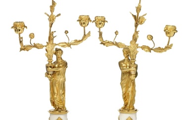 A pair of French Directoire gilt bronze and white marble...
