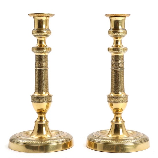 A pair of French Louis Philippe bronze candlesticks. 19th century. H. 25.5 cm. (2)