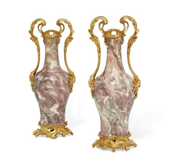 A pair of Louis XV style bronze & marble vases