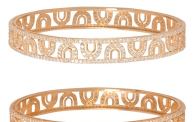 A pair of diamond and 14k gold bangle bracelets