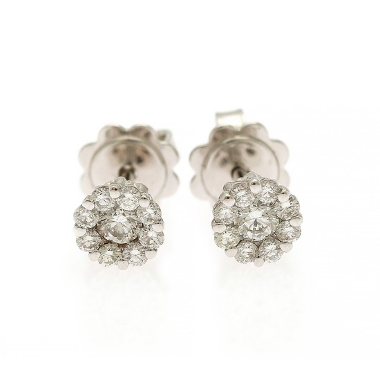 A pair of diamond ear studs each set with nine brilliant-cut diamonds totalling app. 0.49 ct., mounted in 18k white gold. Diam. app. 6 mm. (2)
