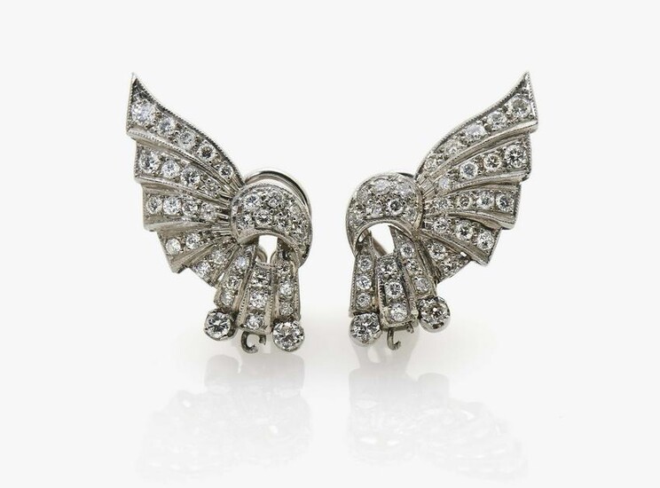 A pair of fan-shaped stud earrings with brilliant cut