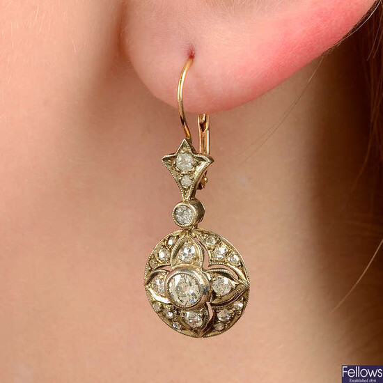 A pair of late 19th century silver and gold, old and rose-cut diamond earrings.