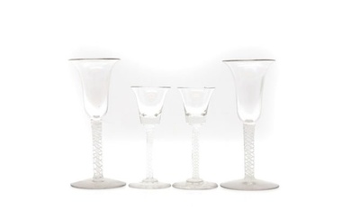 A pair of opaque twist stem wine glasses