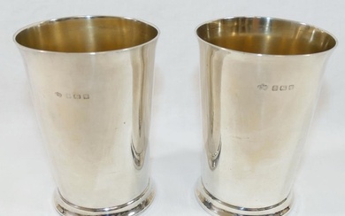 A pair of silver beakers by Elkington and Co., Birmingham 19...