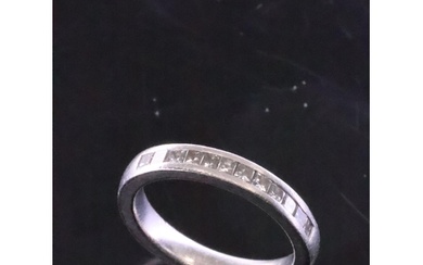 A platinum diamond half eternity ring finger size J