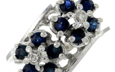 A sapphire and single-cut diamond double cluster crossover ring.
