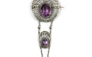 A silver Arts and Crafts amethyst and dog tooth pearl brooch, c.1910