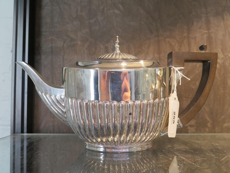 A silver tea pot, gadrooned decoration, W Hutton & Sons Ltd,...