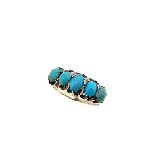 A turquoise half hoop style ring