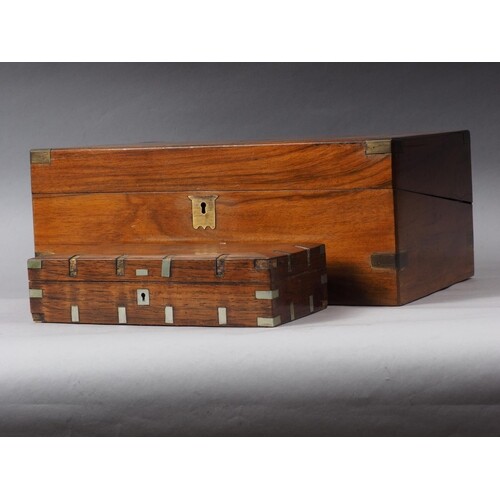 A walnut and brass mounted writing box with fitted interior,...