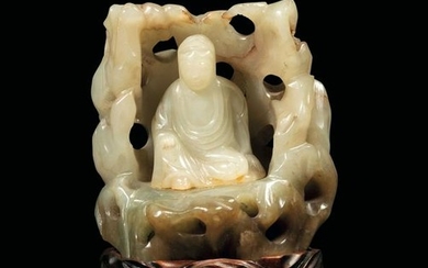 A white jade and russet group, China, Qing Dynasty