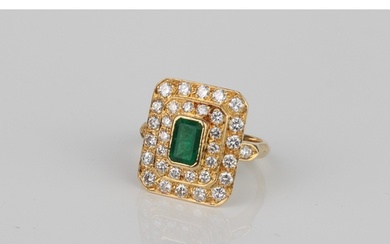 A French 18ct gold, emerald and diamond cluster ring - with ...