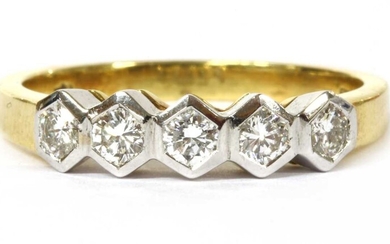 An 18ct gold five stone diamond ring