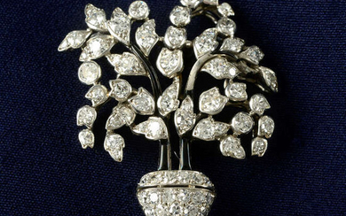 An Art Deco platinum, circular-cut diamond and black enamel giardinetti brooch.