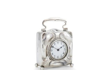 An Arts and Crafts silver desk clock by William Neale