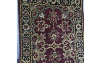 An Indian hand woven full wool pile tea washed Agra rug, 230...