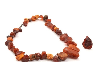 NOT SOLD. An amber necklace with numerous raw amber nuggets. L. 53 cm. Largest nugget 4.5 x 2.3 cm. Weight app. 84 g. (2) – Bruun Rasmussen Auctioneers of Fine Art