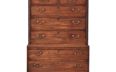 An early 19th century mahogany chest on chest, dentil cornic...