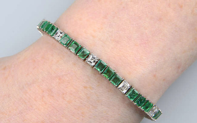 An emerald and square-shape diamond bracelet.