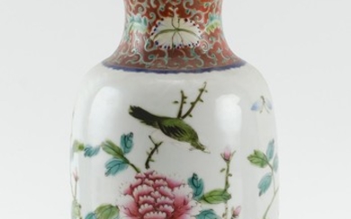 CHINESE FAMILLE ROSE PORCELAIN VASE In elongated ovoid form, with bird and flower decoration. Height 10".