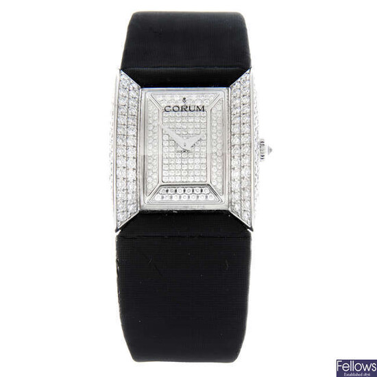 CORUM - a factory diamond set 18ct white gold Butterfly wrist watch, 23x20mm.