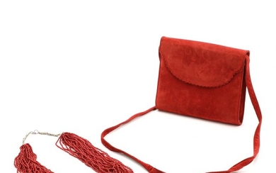 Charles Jourdan: Bag of red suede with blue lining. H 17 x L. 21 x W. 3.5 cm. And a coral necklace. (2) – Bruun Rasmussen Auctioneers of Fine Art